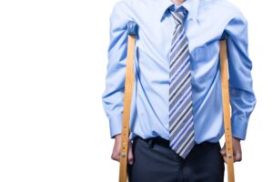 business man using crutches