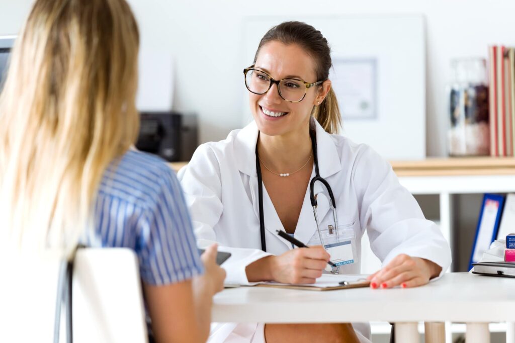 female doctor smiling at her patient