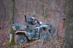man on dirt bike in forest
