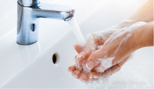 A person washing their hands